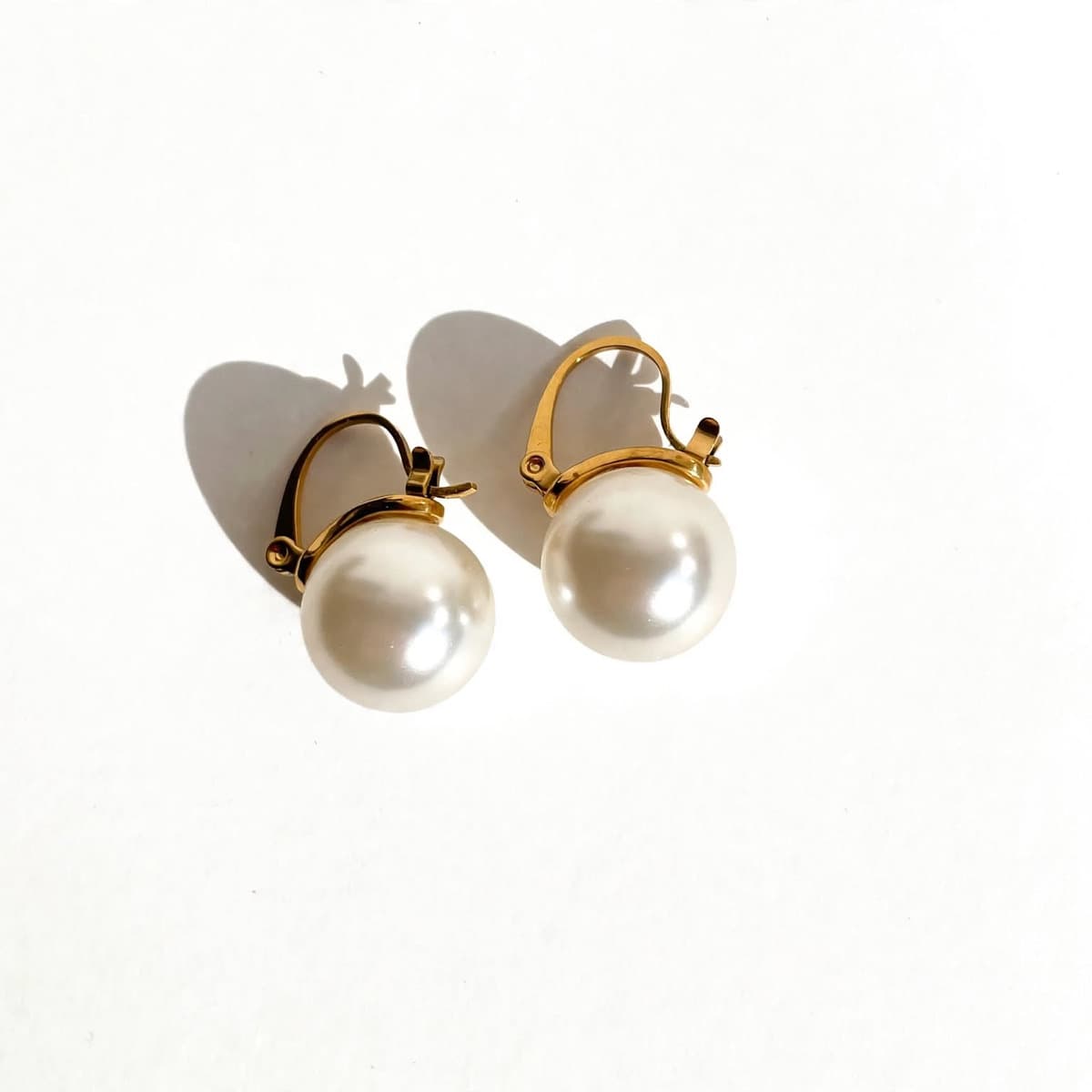 Moon Drop — 316L stainless steel, PVD gold plated, shell pearl
